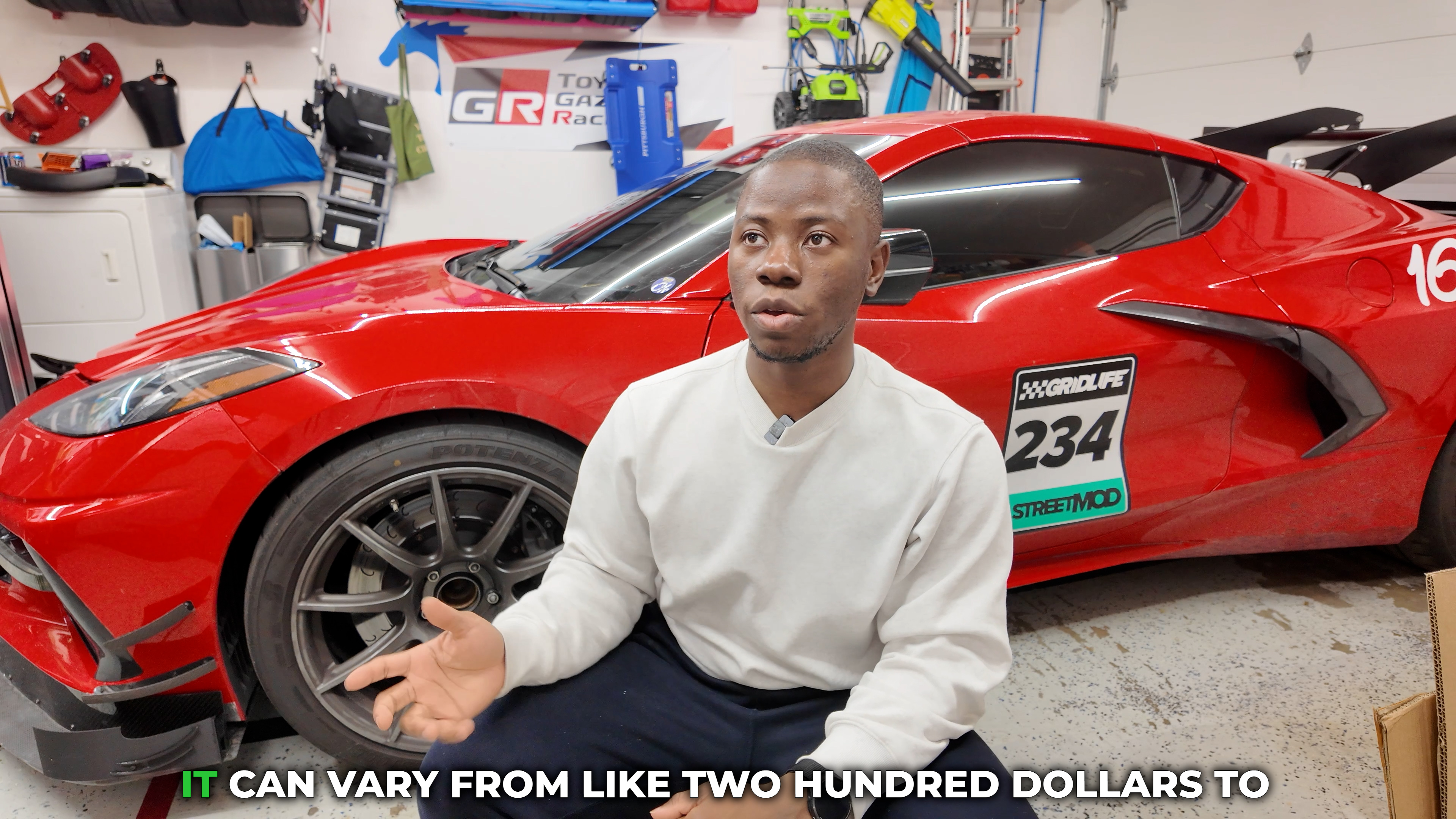 OPE in the garage with the C8 Corvette
