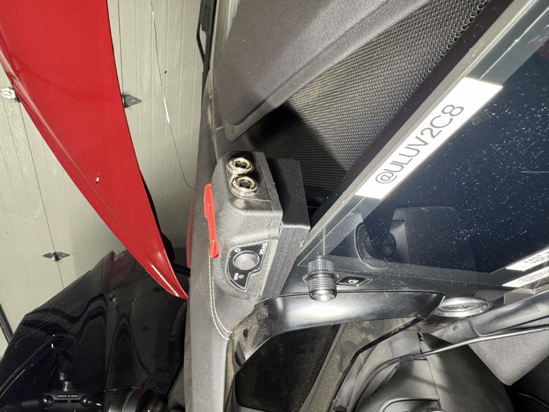 AIM XLog logger in its magnetic dash mount